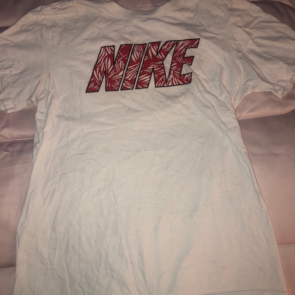 Red and white Nike shirt